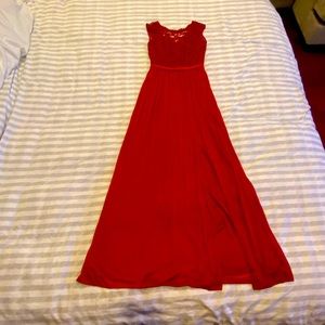 David’s Bridal bridesmaid dress. Deep ruby red. Has slit up left front side.
